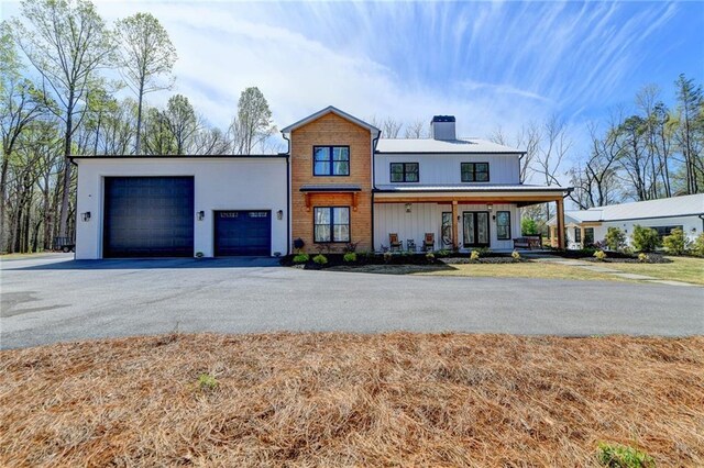 132 Swift Creek Way, Jefferson, GA 30549 - view of front of property with a porch and a garage