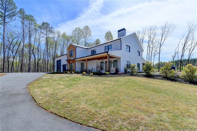132 Swift Creek Way, Jefferson, GA 30549 - view of front facade with a garage and a front lawn