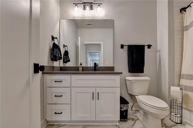 132 Swift Creek Way, Jefferson, GA 30549 - bathroom featuring a shower with shower curtain, vanity, and toilet