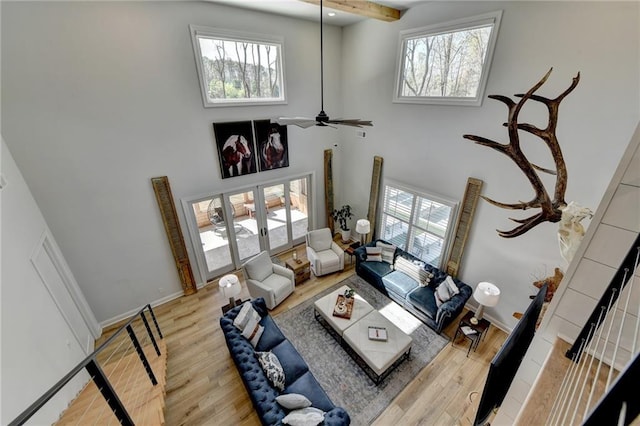 132 Swift Creek Way, Jefferson, GA 30549 - living room featuring a high ceiling, french doors, light hardwood / wood-style floors, and ceiling fan