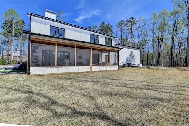 132 Swift Creek Way, Jefferson, GA 30549 - rear view of house featuring a sunroom