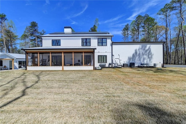 132 Swift Creek Way, Jefferson, GA 30549 - rear view of house featuring a lawn and central AC unit