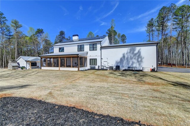 132 Swift Creek Way, Jefferson, GA 30549 - rear view of property featuring a sunroom and cooling unit