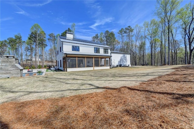 132 Swift Creek Way, Jefferson, GA 30549 - rear view of property featuring a sunroom