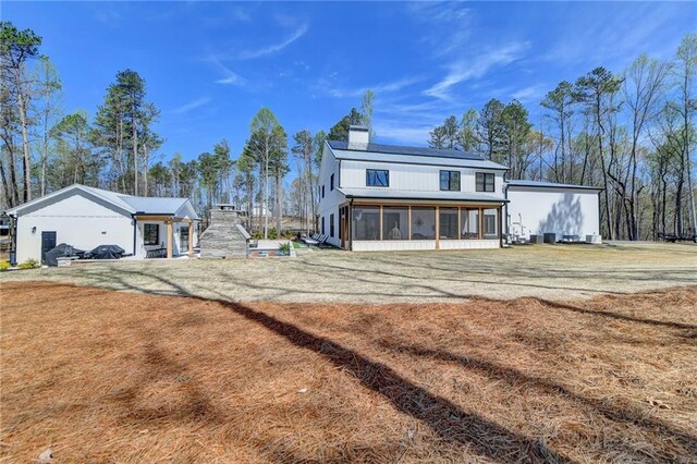 132 Swift Creek Way, Jefferson, GA 30549 - back of house featuring a sunroom
