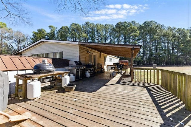 wooden deck featuring grilling area