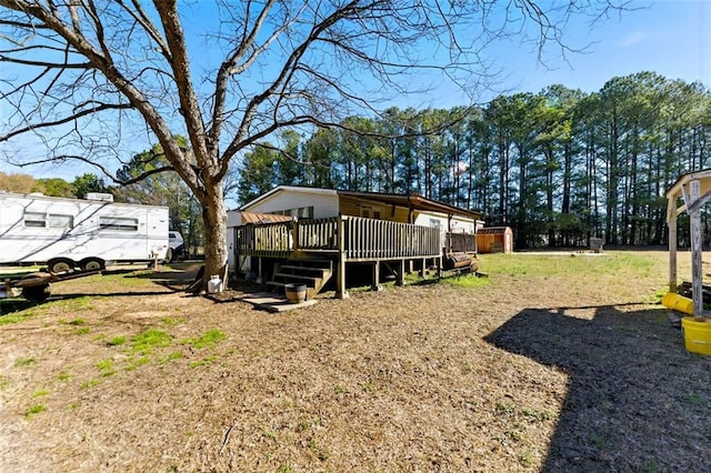 exterior space featuring a wooden deck