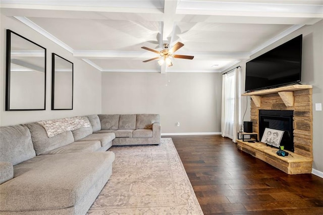 living area featuring dark wood-style flooring, a fireplace, a ceiling fan, and baseboards