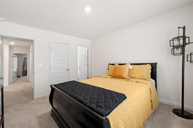 bedroom with recessed lighting, carpet, attic access, and baseboards