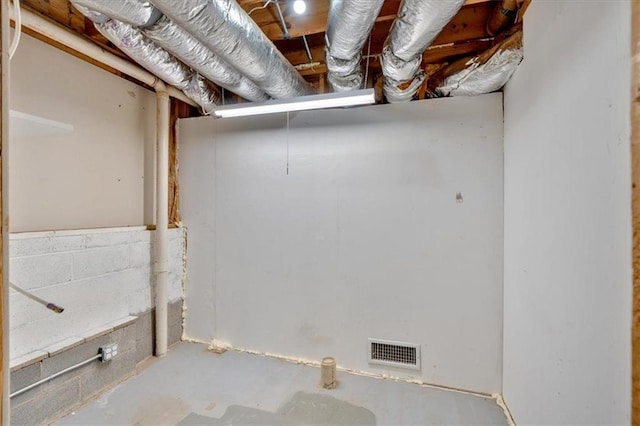 unfinished basement with visible vents