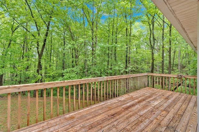 deck with a wooded view