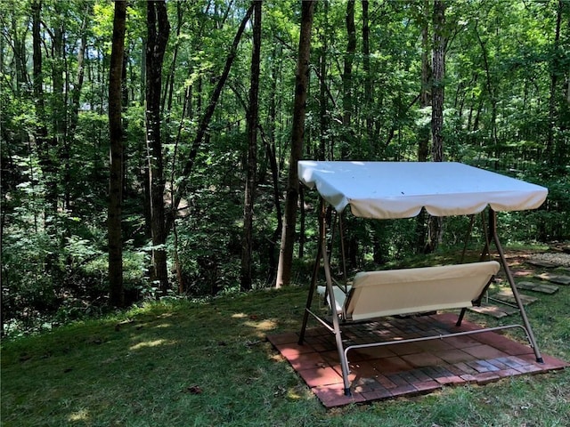 view of yard featuring a view of trees
