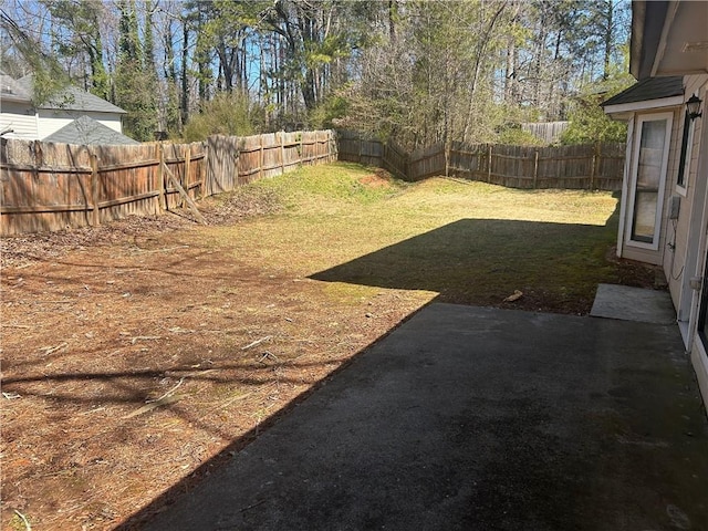 view of yard featuring a fenced backyard