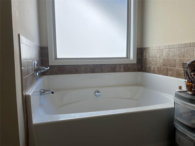 bathroom featuring a garden tub