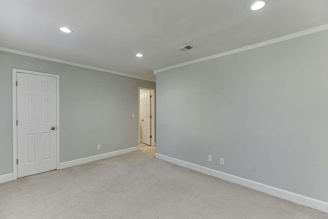 empty room with baseboards, visible vents, and recessed lighting