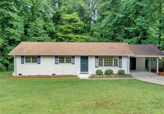 5689 Woodland Dr, Acworth, GA 30102 - ranch-style home with brick siding, an attached carport, concrete driveway, and entry steps