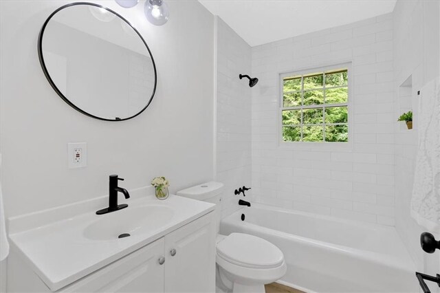 5689 Woodland Dr, Acworth, GA 30102 - bathroom with vanity,  shower combination, and toilet