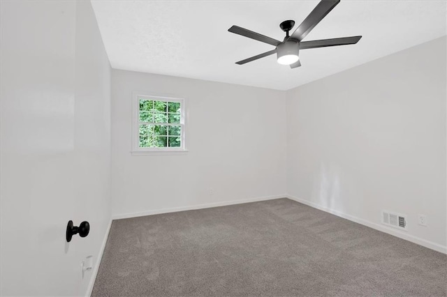5689 Woodland Dr, Acworth, GA 30102 - unfurnished room with carpet, a ceiling fan, and baseboards