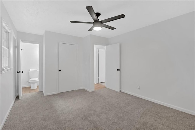 5689 Woodland Dr, Acworth, GA 30102 - unfurnished bedroom featuring light colored carpet, baseboards, and ensuite bathroom