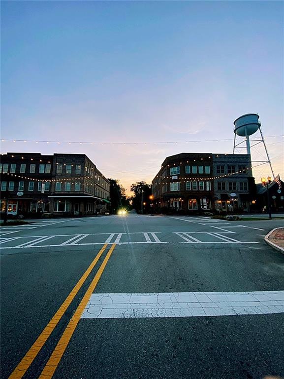 view of parking at dusk