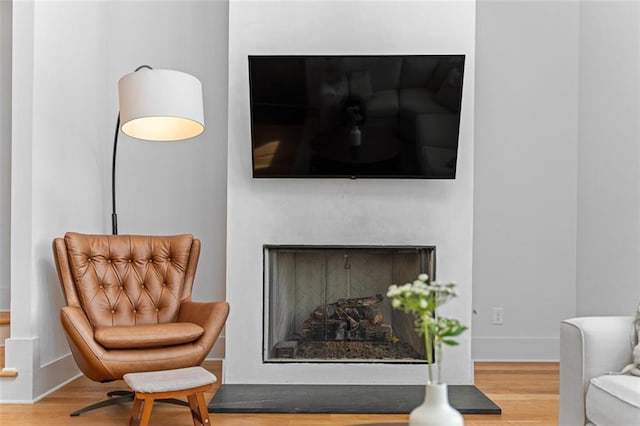 155 Breakspear Ln, Fayetteville, GA 30214 - sitting room with wood finished floors, a fireplace, and baseboards