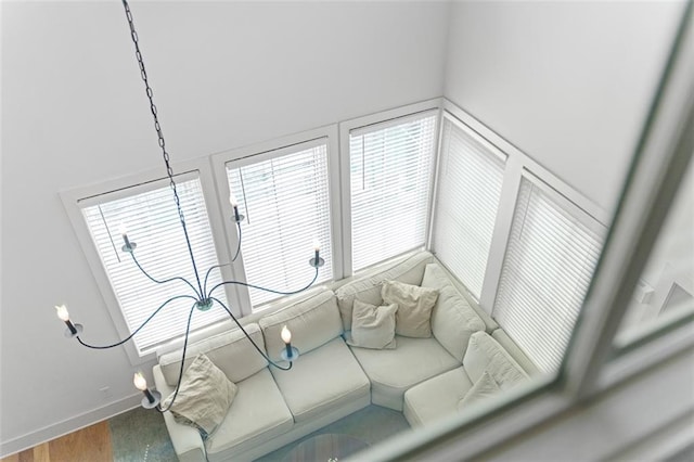 155 Breakspear Ln, Fayetteville, GA 30214 - unfurnished living room featuring a towering ceiling, wood finished floors, and baseboards