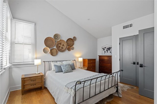 155 Breakspear Ln, Fayetteville, GA 30214 - bedroom with wood finished floors, lofted ceiling, and baseboards