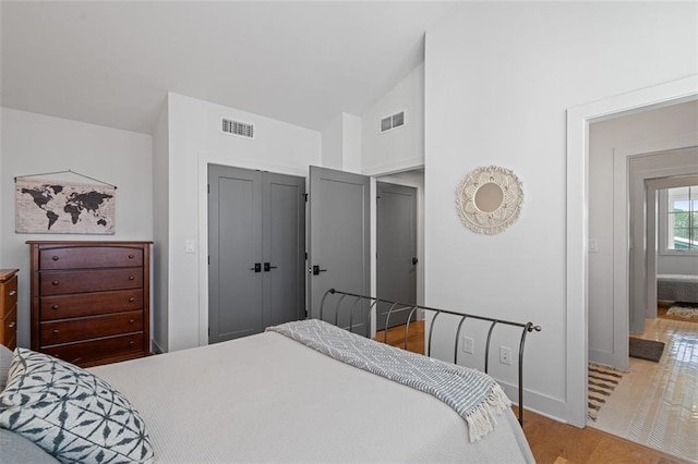 155 Breakspear Ln, Fayetteville, GA 30214 - bedroom with high vaulted ceiling, wood finished floors, baseboards, and a closet
