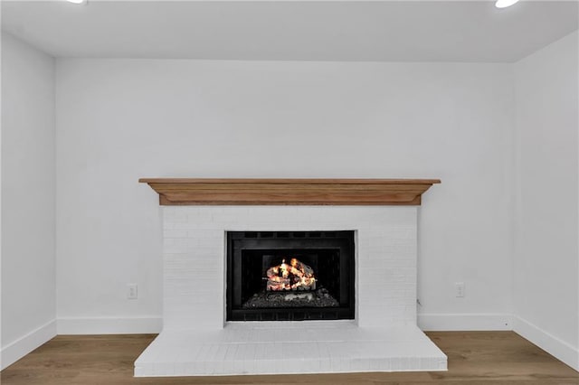 2601 Garland Way, Duluth, GA 30096 - detailed view of a fireplace, recessed lighting, baseboards, and wood finished floors