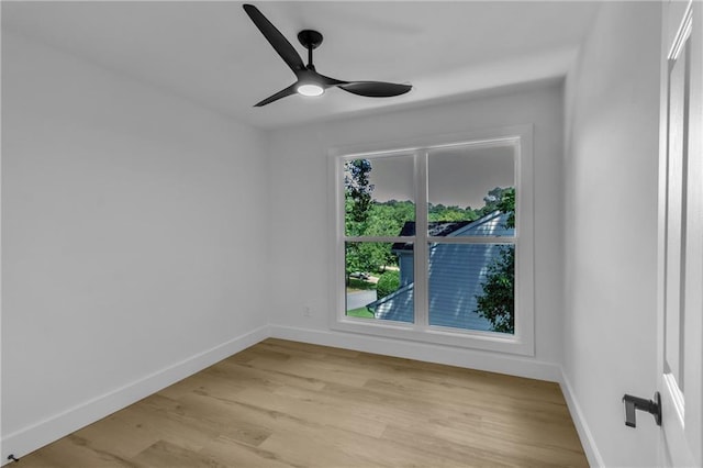 2601 Garland Way, Duluth, GA 30096 - spare room featuring a ceiling fan, baseboards, and light wood finished floors