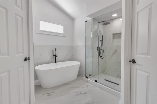2601 Garland Way, Duluth, GA 30096 - bathroom with a marble finish shower, a freestanding bath, marble finish flooring, wainscoting, and lofted ceiling
