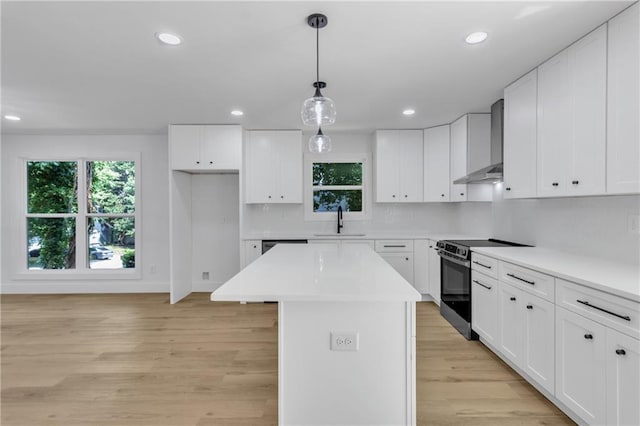 2601 Garland Way, Duluth, GA 30096 - kitchen with wall chimney exhaust hood, electric stove, a sink, healthy amount of natural light, and recessed lighting