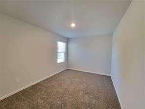 115 Deer Xing, Temple, GA 30179 - empty room with baseboards and recessed lighting