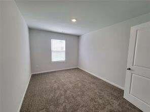 115 Deer Xing, Temple, GA 30179 - carpeted empty room with baseboards