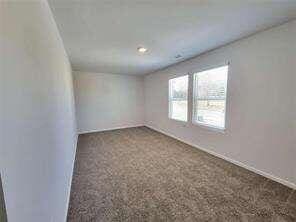 115 Deer Xing, Temple, GA 30179 - carpeted empty room featuring baseboards and recessed lighting