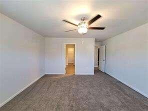 115 Deer Xing, Temple, GA 30179 - unfurnished bedroom with baseboards and a ceiling fan