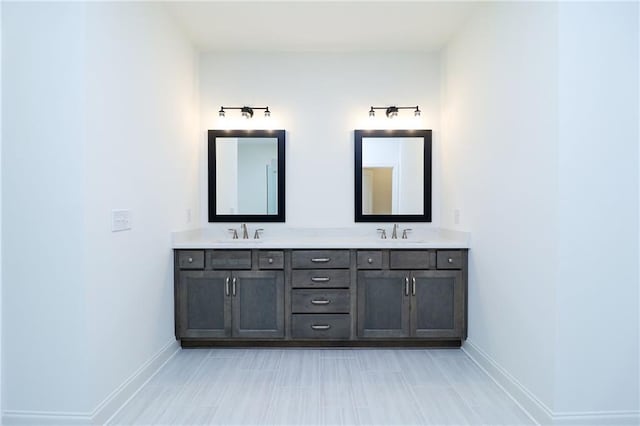 2109 Ella Springs Dr, Covington, GA 30014 - full bath featuring baseboards and double vanity