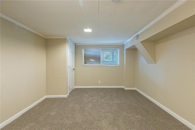 basement featuring carpet flooring and ornamental molding