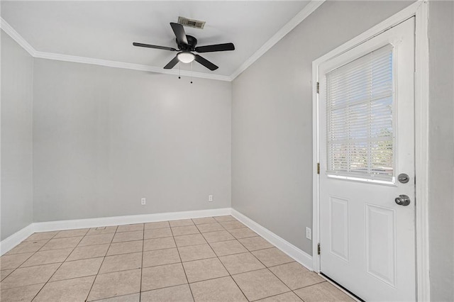 empty room with light tile patterned floors, ornamental molding, and ceiling fan