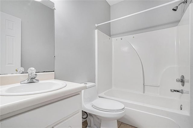 full bathroom with toilet, washtub / shower combination, tile patterned floors, and vanity