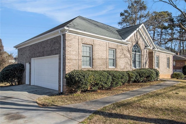 view of property exterior with a garage