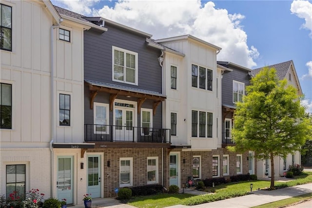 3484 Orchard St, Atlanta, GA 30354 - view of property with board and batten siding and brick siding