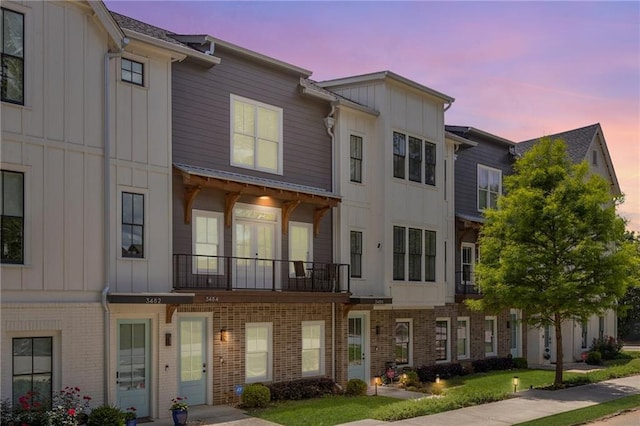 3484 Orchard St, Atlanta, GA 30354 - view of property featuring board and batten siding and brick siding