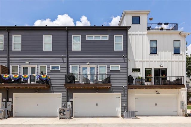 3484 Orchard St, Atlanta, GA 30354 - rear view of property featuring an attached garage and board and batten siding