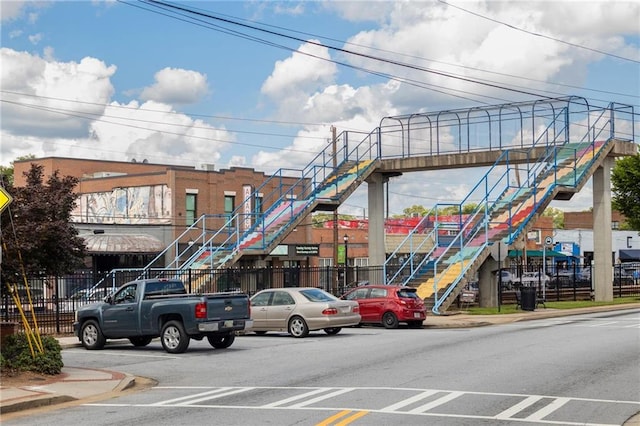 3484 Orchard St, Atlanta, GA 30354 - view of asphalt road featuring stairs, sidewalks, and curbs