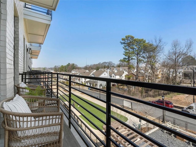 balcony featuring a residential view