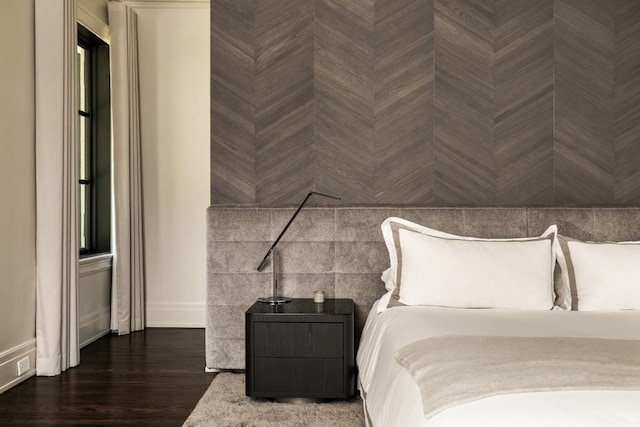 unfurnished bedroom featuring dark wood-type flooring