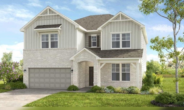 view of front facade with a garage and a front lawn