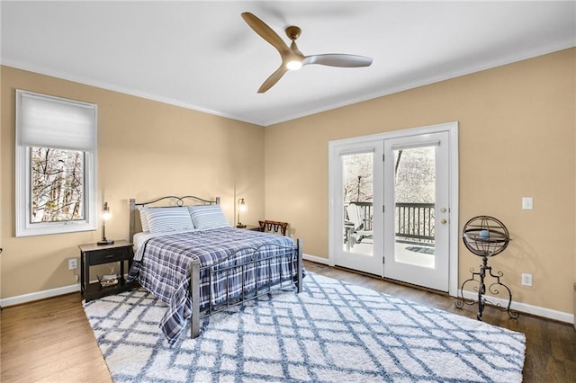 bedroom with ceiling fan, wood finished floors, baseboards, access to outside, and ornamental molding