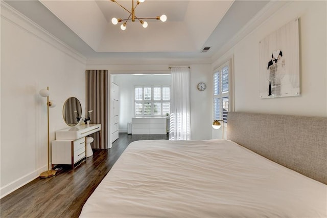 3355 Olivia Ct, Cumming, GA 30041 - bedroom featuring dark wood-style flooring, a chandelier, a tray ceiling, and baseboards